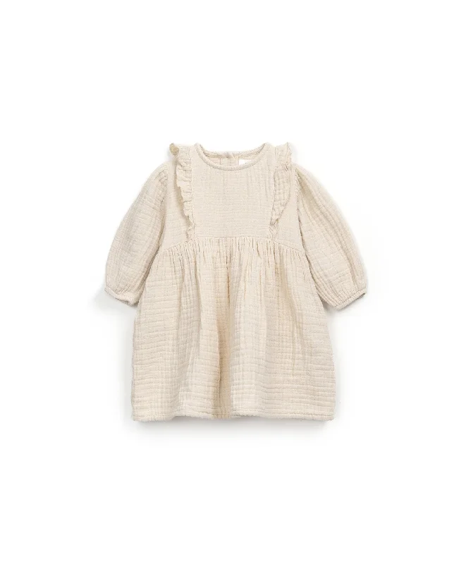 Dress with coconut buttons