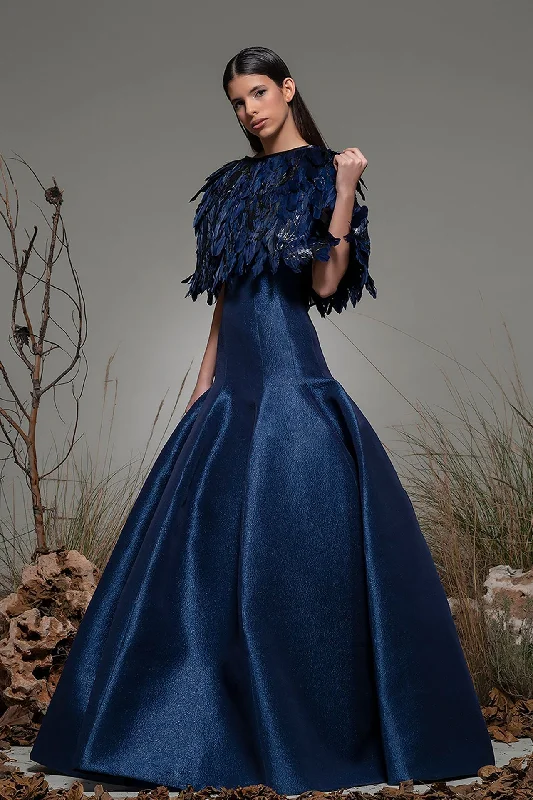 Pleated fit and flare gown featuring feathered cape Tunics Stylish elegant